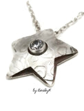 Original design by BeaDyK Sterling silver star shaped "Pillow" pendant set with a clear CZ on sterling rolo chain