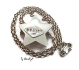 Original design by BeaDyK Sterling silver star shaped "Pillow" pendant set with a clear CZ on sterling rolo chain