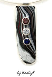 Pendant with Corvette Fordite cabochon set in sterling silver and set with red, white and blue cubic zirconias by BeaDyK.