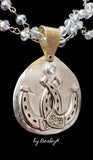 Lucky Horseshoe Concho Pendant with Cubic Zirconia on brass back plate on crystal chain