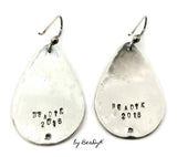 Sterling Silver Etched Teardrop shaped earrings with hematite stone